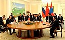 Meeting with Chinese President Xi Jinping and President of Mongolia Tsakhiagiin Elbegdorj.