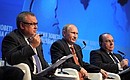At the plenary session of the RUSSIA CALLING! Investment Forum. With VTB Bank CEO Andrei Kostin (left) and UBS bank Chairman of the Board Axel. A. Weber.