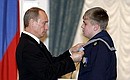 Awarding state decorations. Sailor Timofei Smirnov receives the Ushakov Medal.