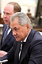 Chief of Staff of the Presidential Executive Office Anton Vaino, left, and Defence Minister Sergei Shoigu before a meeting with permanent members of Security Council.