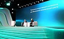 На конференции Artificial Intelligence Journey 2022. С президентом, председателем правления Сбербанка Германом Грефом.