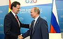 C Председателем Правительства Испании Мариано Рахоем. Фотохост-агентство G20 Russia