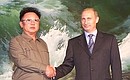 Vladimir Putin with North Korean leader Kim Jong-il.