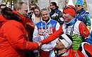 With Russian athletes Vladislav Lekomtsev and Roman Petushkov who won gold medals in the open relay event at the Sochi Paralympics. Photo: RIA Novosti