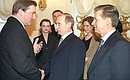 President Putin with President of the National Olympic Committee Leonid Tyagachyov and the famous Russian athlete Vladislav Tretyak (left) after a meeting of the State Council on Physical Fitness and Sports.