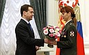 Presenting state decorations. Master sergeant Melitina Beryozova received the Order of Courage.