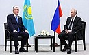 С Президентом Казахстана Касым-Жомартом Токаевым. Фото: Сергей Бобылёв, ТАСС
