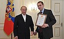 A commendation awarded to goalie Yevgeny Biryukov for his enormous contribution to the victory of the Russian national hockey team at the 2012 Hockey World Championships.