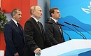 During a presentation on Russian Far Eastern development achievements. With Vice Prime Minister and Presidential Plenipotentiary Envoy to the Far Eastern Federal District Yury Trutnev (left) and Minister for the Development of the Far East and the Arctic Alexei Chekunkov.