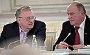 Liberal Democratic Party leader Vladimir Zhirinovsky (left) and Communist Party leader Gennady Zyuganov at a State Council meeting on Russia’s environmental development for future generations.