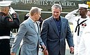 President Putin\'s arrival at the Camp David presidential retreat, where he was met by US President George W. Bush at the helicopter pad.
