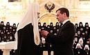 After the meeting with participants of the Bishops' Council Dmitry Medvedev presented Patriarch Kirill the Order of Alexander Nevsky.