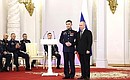 Presentation of Gold Star medals to Heroes of Russia. With Lieutenant Colonel Dashibal Munkozhargalov. Photo: Valery Sharifulin, TASS