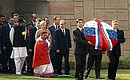President Putin laying a wreath at the place of Mahatma Gandhi\'s cremation.