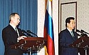 President Putin at a news conference with South Korean President Kim Dae-jung.