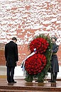 Laying a wreath at the Tomb of the Unknown Soldier