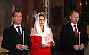 Dmitry Medvedev, Svetlana Medvedeva, Vladimir Putin at the Easter service.
