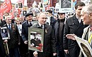 Владимир Путин принял участие в акции «Бессмертный полк» .