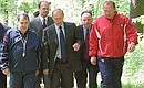President Putin with head coach of the Russian football team Oleg Romantsev (right) and senior coach of the Russian football team Mikhail Gershkovich (left) at the Russian football team training camp.