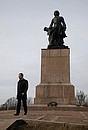Laying flowers at the monument to Peter the Great.