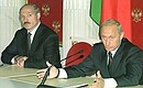 President Putin and Belarusian President Alexander Lukashenko talking to journalists.