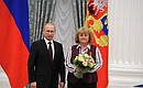 Presenting Russian Federation state decorations. The Order for Services to the Fatherland, IV degree, is awarded to Deputy Chairperson of the State Duma Committee on Defence Svetlana Savitskaya.