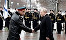 With Defence Minister Sergei Shoigu after a wreath-laying ceremony at the Tomb of the Unknown Soldier.