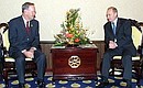 President Putin meeting with Canadian Prime Minister Jean Chretien.