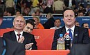 С Премьер-министром Великобритании Дэвидом Кэмероном на олимпийских соревнованиях по дзюдо.