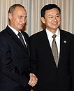 President Putin with Thai Prime Minister Thaksin Shinawatra.