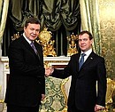 С Президентом Украины Виктором Януковичем.