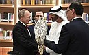 Vladimir Putin presents a white gyrfalcon to Crown Prince of Abu Dhabi and Deputy Supreme Commander of the UAE Armed Forces Mohammed bin Zayed Al Nahyan.