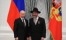 Presenting Russian Federation state decorations. The Order for Services to the Fatherland, IV degree, is awarded to Chief Rabbi of Russia Berl Lazar.