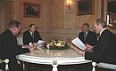 President Putin during talks with Belarusian President Alexander Lukashenko, Ukrainian President Leonid Kuchma and Kazakh President Nursultan Nazarbayev.