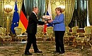 С Федеральным канцлером Германии Ангелой Меркель. Фото РИА «Новости»
