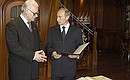 Petersburg. Handing over of an autographed copy of Alexander Pushkin\'s poem ”On the hills of Georgia“. With director of the institute Nikolai Skatov.