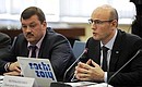 2014 Sochi Olympics Organising Committee President Dmitry Chernyshenko (right) and President and Chairman of the Board of State Corporation Olympstroy Sergei Gaplikov at a meeting on preparations for the 2014 Sochi Olympics.