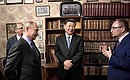At the exhibition of collections of the St Petersburg State University Scientific Library with President of the People’s Republic of China Xi Jinping. University’s rector Nikolai Kropachev gives explanations.