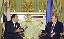 President Putin meeting with Egyptian President Hosni Mubarak.