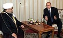 President Vladimir Putin and leader of Azerbaijani Muslims Sheikh-ul-Islam Khadji Allahshukyur Pashazade.