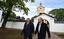 With Rosneft CEO Igor Sechin during a visit to Konevsky Nativity of the Theotokos Monastery.