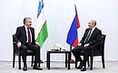 With President of Uzbekistan Shavkat Mirziyoyev. Photo: Sergei Bobylev, TASS