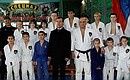 Дмитрий Медведев присутствовал на занятии по обучению элементам самбо детей подшефной школы.