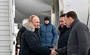 Arrival in Yekaterinburg. Meeting with Presidential Plenipotentiary Envoy to the Urals Federal District Igor Kholmanskikh and Sverdlovsk Region Governor Yevgeny Kuivashev (right).