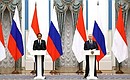 Vladimir Putin and President of Indonesia Joko Widodo make press statements following Russian-Indonesian talks. Photo: TASS