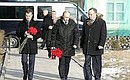 Before placing flowers at the memorial to the victims of the 1962 Novocherkassk tragedy and the monument to Ataman Platov. With First Deputy Prime Minister Dmitry Medvedev (left) and Mayor of Novocherkassk Anatoly Volkov.