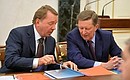 Chief of Staff of the Presidential Executive Office Sergei Ivanov (right) and Presidential Aide Vladimir Kozhin before the meeting of the Commission for Military Technology Cooperation with Foreign States.