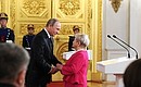 Государственная премия Российской Федерации за выдающиеся достижения в области гуманитарной деятельности 2014 года присуждена Александре Пахмутовой.