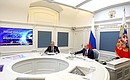 With VTB Bank President and Chairman of the Board Andrei Kostin during a plenary session of the Russia Calling! Investment Forum (via videoconference).