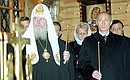 President Vladimir Putin in the Chapel of the Sovereign Icon of the Blessed Virgin near the Cathedral of Christ the Saviour in Moscow attending a memorial service for those killed in the crash of an Ilyushin-18 near Batumi on October 25.
